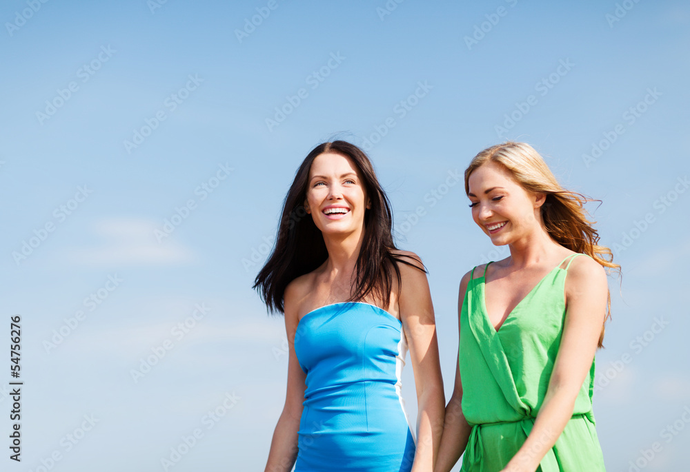 Sticker girls walking on the beach