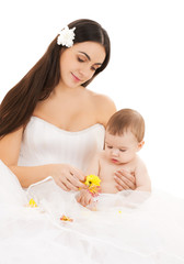Obraz na płótnie Canvas bride in white dress with little baby