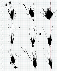 Ink splashes on white paper.