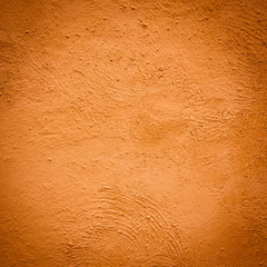 Grunge orange wall (urban texture)