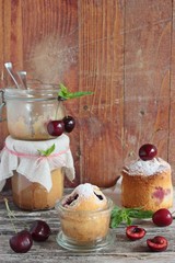 Cherry cake on wooden background