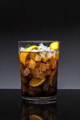 Glass of cola with ice