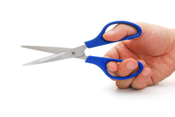 using a blue scissors on white with clipping path