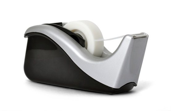 Angled view of sticky tape dispenser on white background