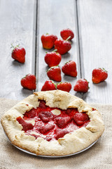 Top view of strawberry galette. Summer pie filled