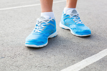 Fototapeta na wymiar Closeup of runners shoe - running concept