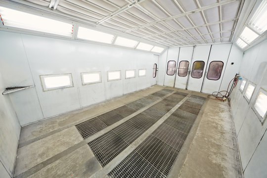 Empty paint-spraying booth for car painting, view from corner
