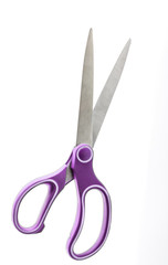 Purple scissors isolated on a white background
