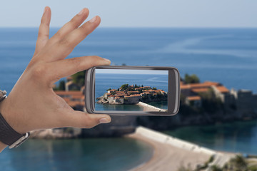 Taking a picture with black smartphone