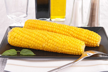 two corn on plate