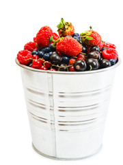 Sweet berries in bucket