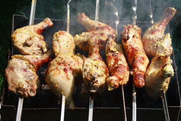Grilled chicken Leg on the grill