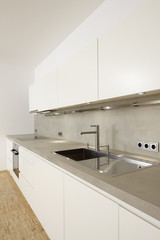 a modern kitchenette oblique angle