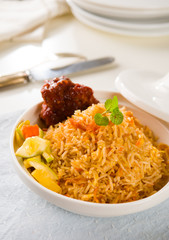 Biryani chicken rice cooked in arab style tajine with traditiona