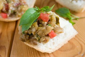 Caviar, eggplant salad on bread