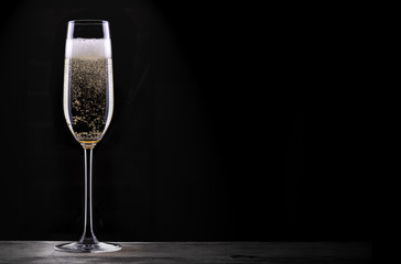 glass of champagne isolated on black background - Powered by Adobe