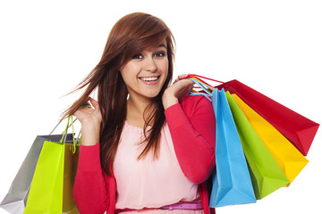 Smiling woman holding shopping bags