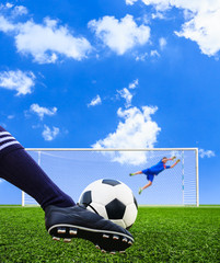 foot shooting soccer ball to goal, penalty