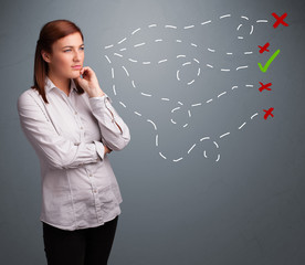 Young woman choosing between right and wrong signs