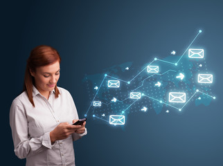 Young lady holding a phone with arrows and message icons