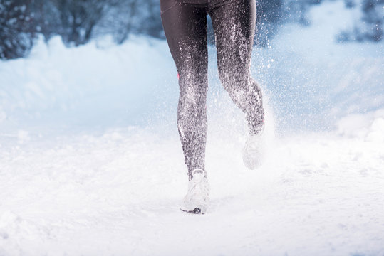 Woman Running In Winter