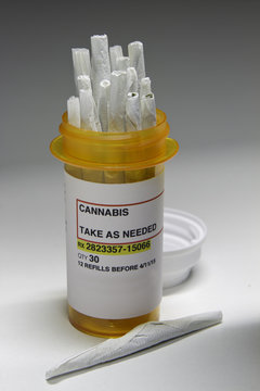 Cannabis in prescription bottle, vertical