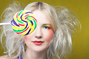 Fototapeta premium Girl with lollipop