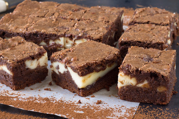 Pieces of chocolate cheesecake brownies