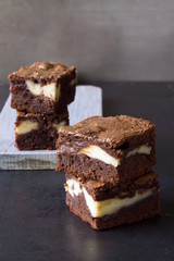 Pieces of chocolate cheesecake brownies