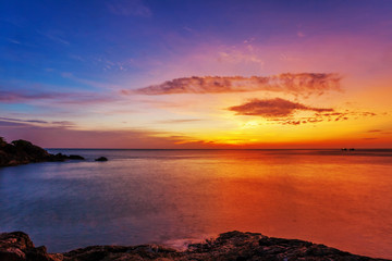 Fototapeta na wymiar Tropical beach at sunset.