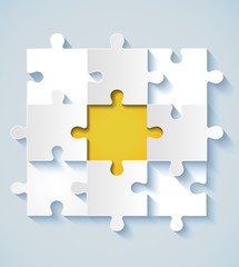 Paper puzzle with yellow the middle for business concepts