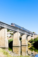 train on railway viaduct in Douro Valley, Portugal