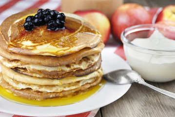 Pile of pancakes in the white plate