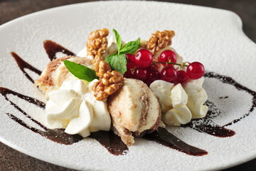 Nut ice cream with cranberries and cream