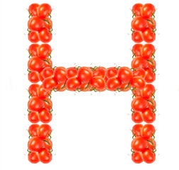 Letters of red tomatoes on white background