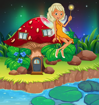 A fairy above the red mushroom house