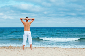Portrait of man on beach