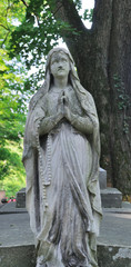 Old statue in Lychakiv Cemetery in Lviv, Ukraine