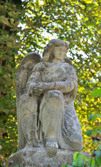 Old statue in Lychakiv Cemetery in Lviv, Ukraine