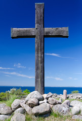 Old wooden cross on Hano island