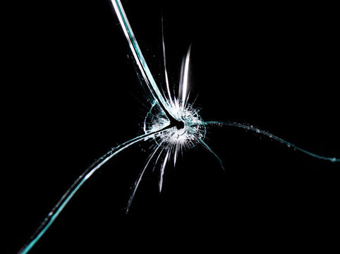 Broken glass, isolated on black background