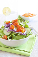 Healthy Salad with tomato, onion, cucumber and lettuce