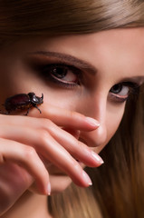 Portrait of beautiful young woman with makeup