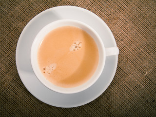 coffee over old burlap background