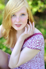 Fototapeta premium Outdoor portrait of a beautiful girl - closeup
