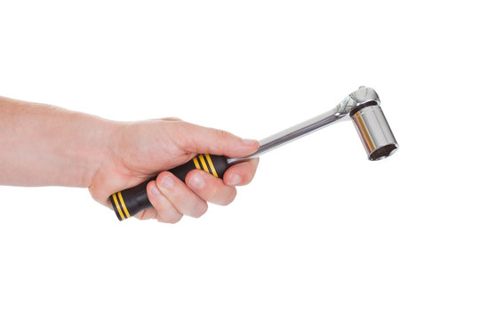 Male Hand Holding Ratchet Tool