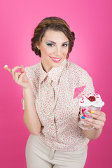 Happy retro young woman eating ice-cream