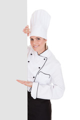 Female Chef Showing Blank Placard