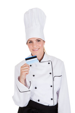 Female Chef Holding Credit Card