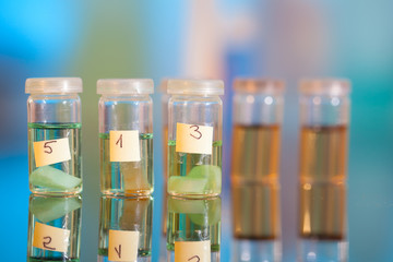 samples in plastic vials for microscopy and biopsy tissue . biol